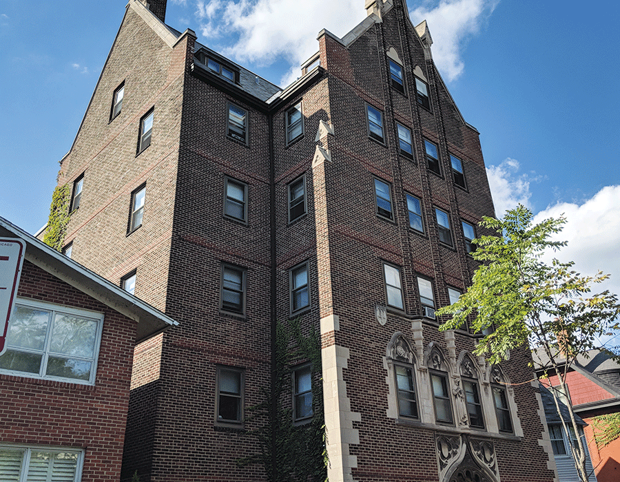 Vintage Apartment building along tree-lined street in Hyde Park 