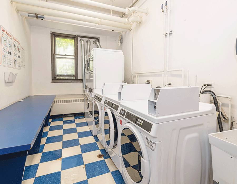Laundry room at hyde Park apartment building 