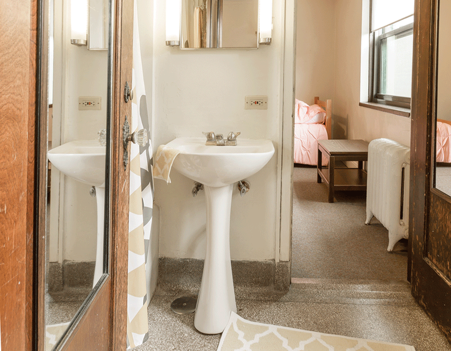 Vintage bathroom with modern updates, shared between units at 5748 S Blackstone Avenue, Hyde Park 